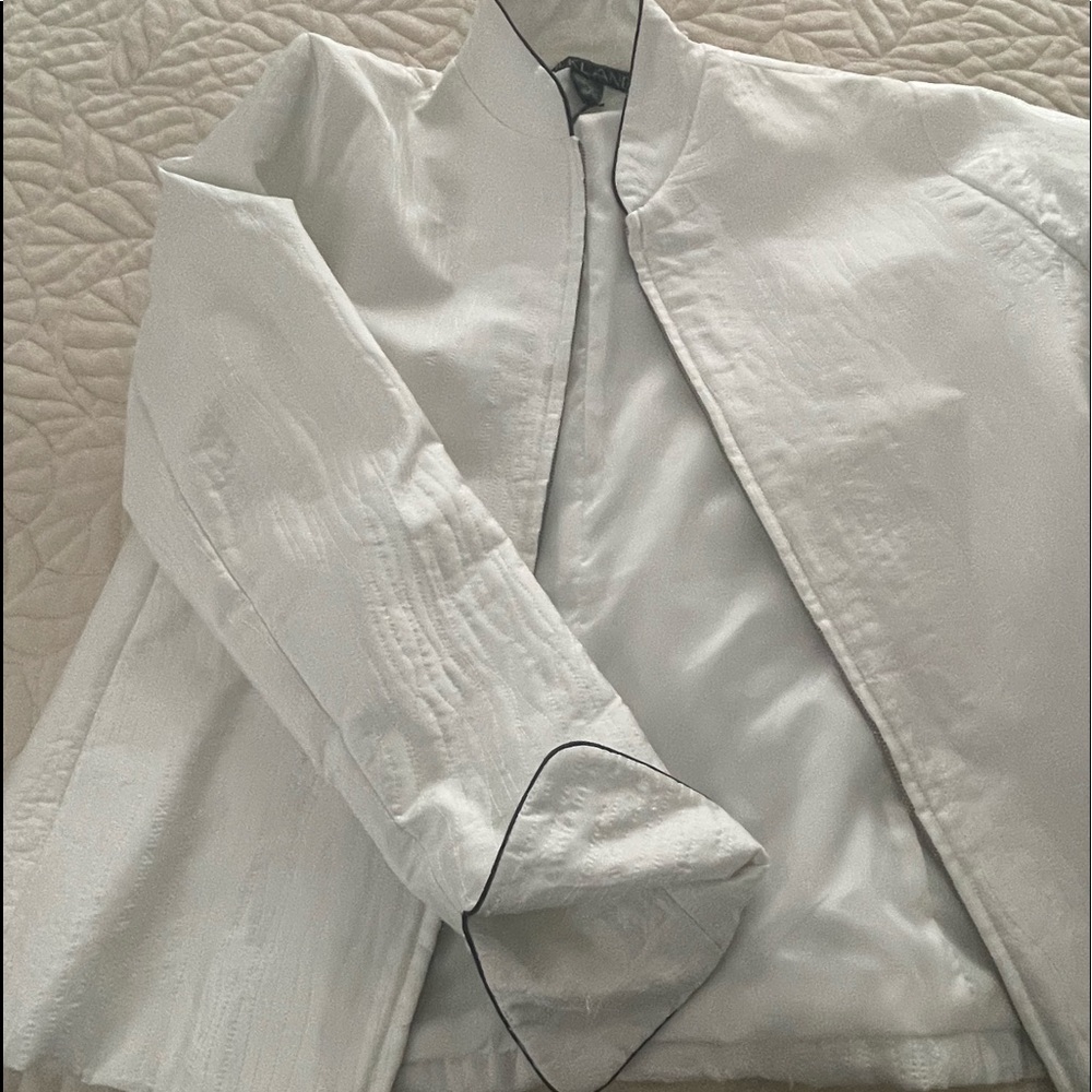 Quilted and lined. Will go with so many outfits.